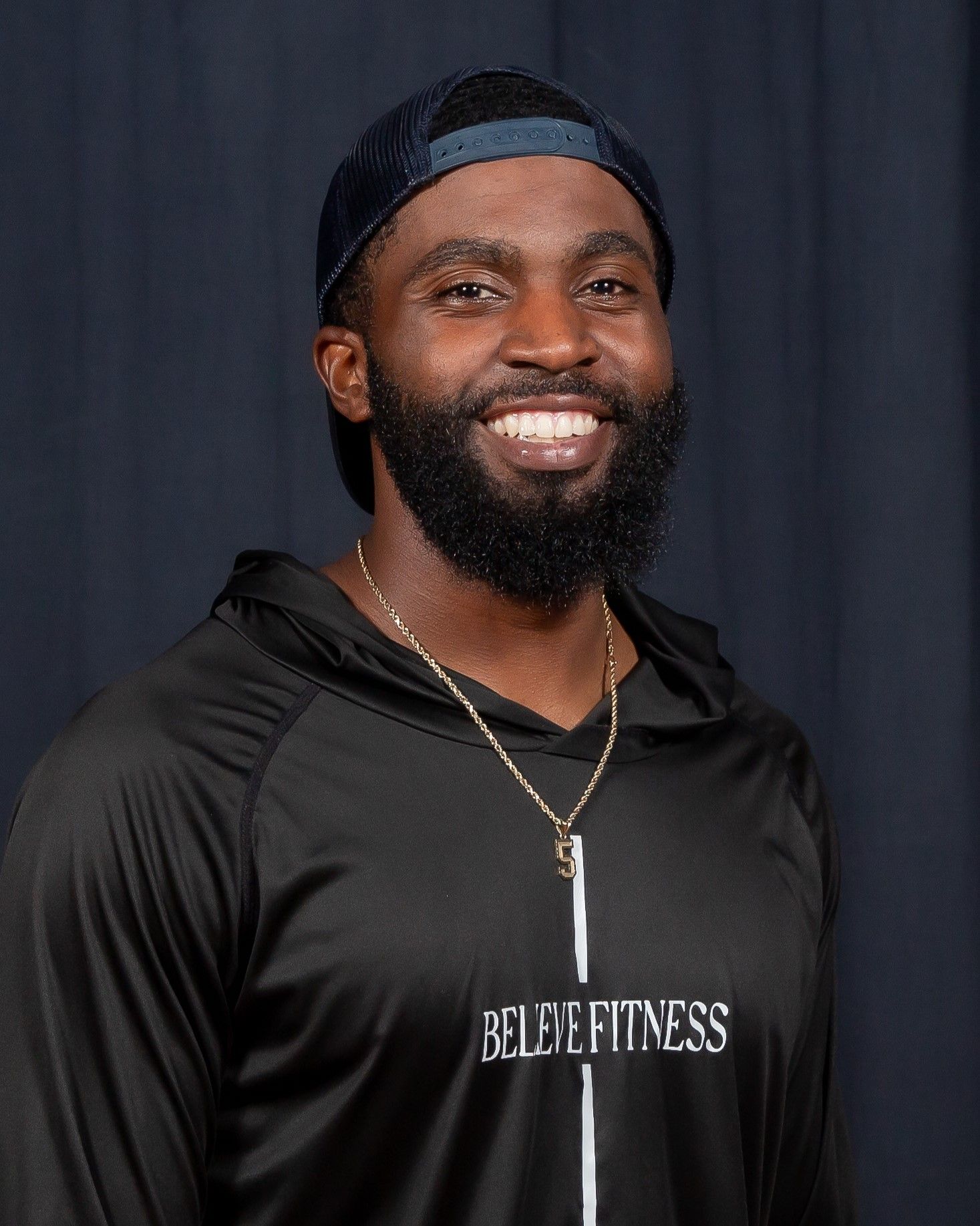 Dancing for the Arts star Amir Myles, wearing a Believe Fitness shirt