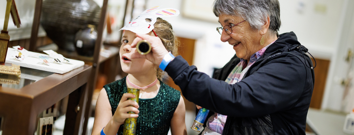 young girl enjoying art exploration at one of the family programs